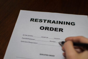 Ask a Domestic Violence Attorney: What Happens if I Violate a Restraining Order?